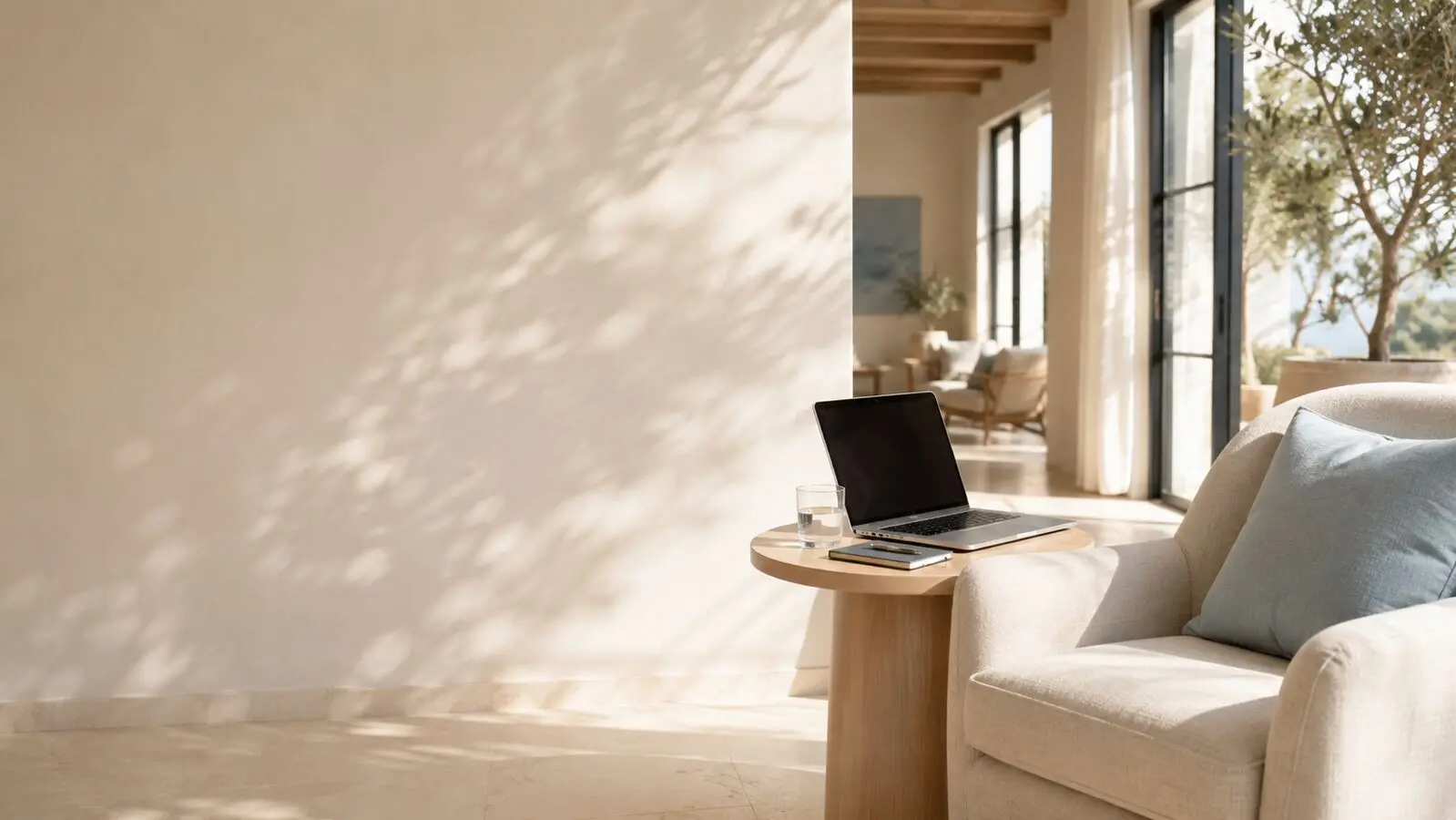 Sunlit California interior with a laptop prepared for a private telehealth appointment